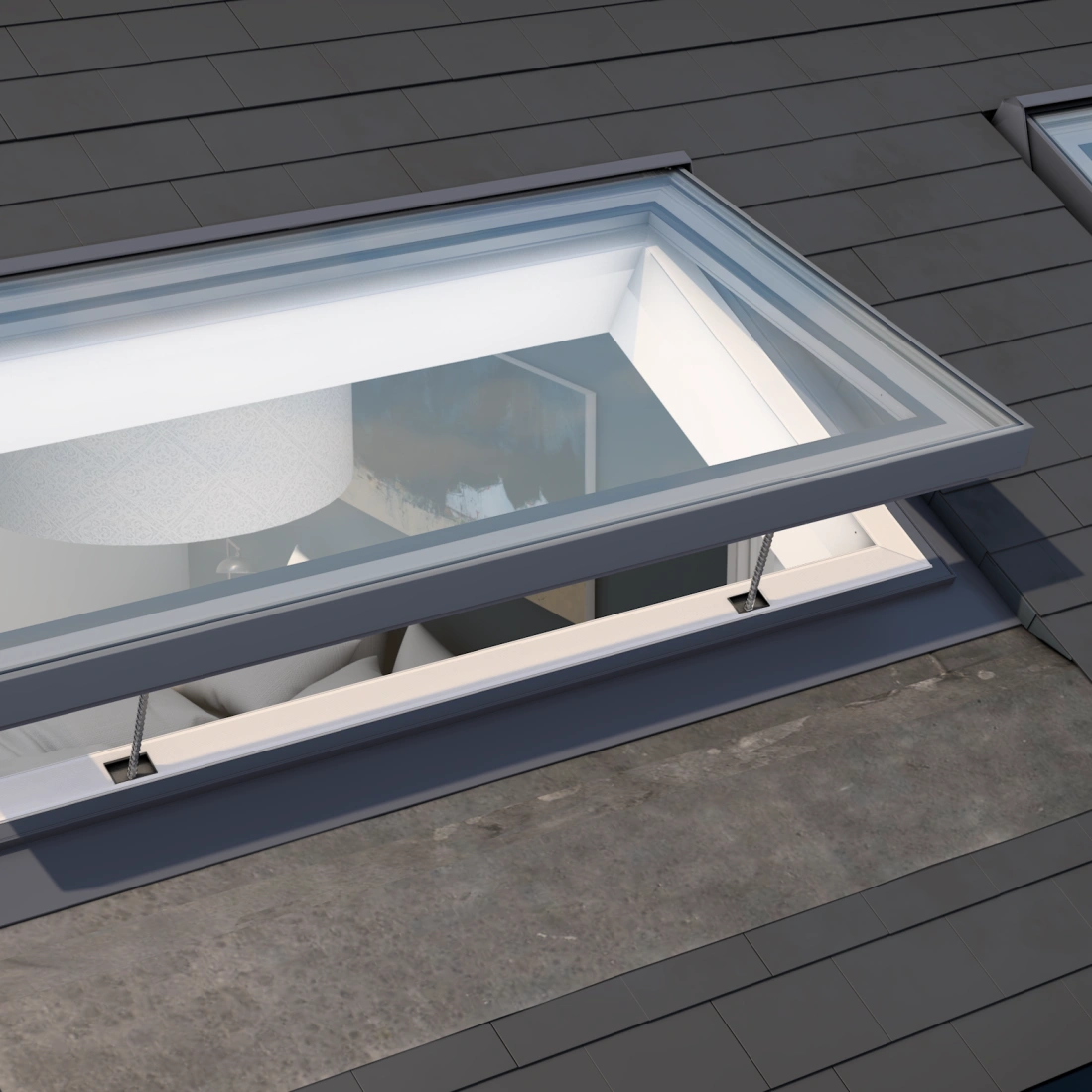 Two skylights on a sloped roof, each featuring a rectangular design with clear glass panes, allowing light to enter into a modern interior space. The roof is covered with dark shingles, and one skylight partially reveals a glimpse of a light fixture inside.